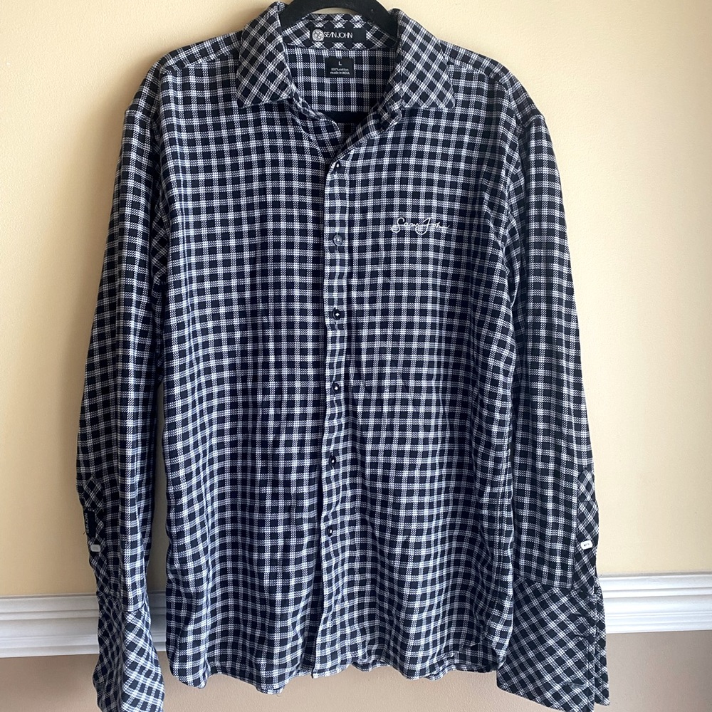 Long sleeve black and white button up.